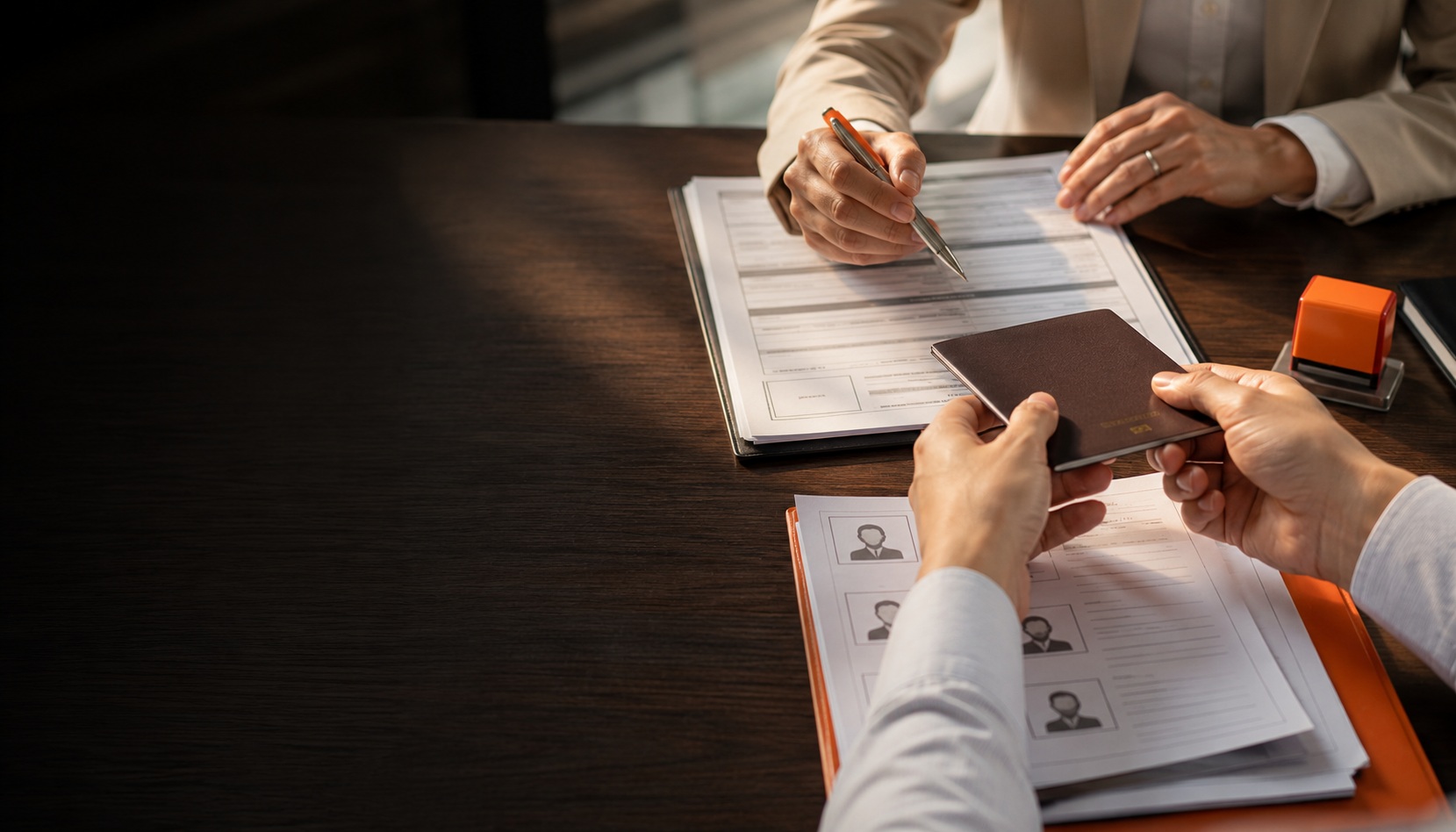 Work pass services Malaysia — People Profilers JTKSM-licensed Employment Agency reviewing pass application paperwork